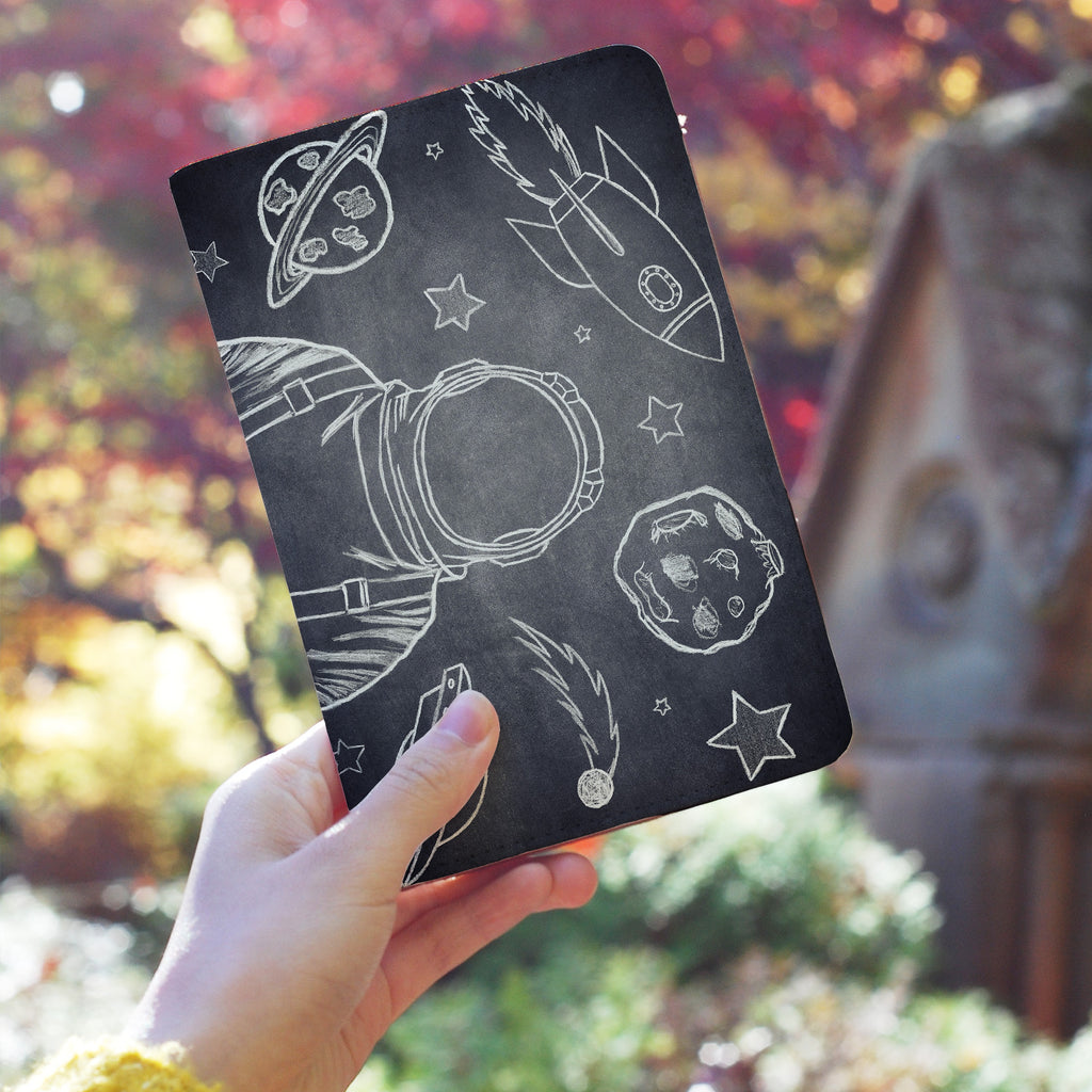 a girl holding personalized RFID blocking passport travel wallet with Astronaut Space design