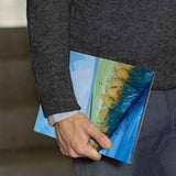 A business man holds Personalized VistaCase reMarkable Pen Holder Case with Abstract Painting design