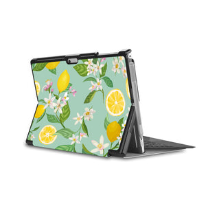 the back side of Personalized Microsoft Surface Pro and Go Case in Movie Stand View with Tropical Fruits design - swap