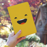 a girl holding personalized RFID blocking passport travel wallet with Emoji 1 design