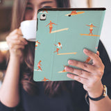 a girl is holding and viewing personalized iPad folio case with Summer design 
