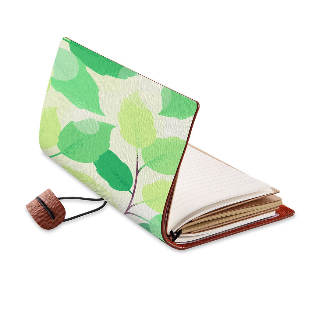 opened view of midori style traveler's notebook with Leaves design