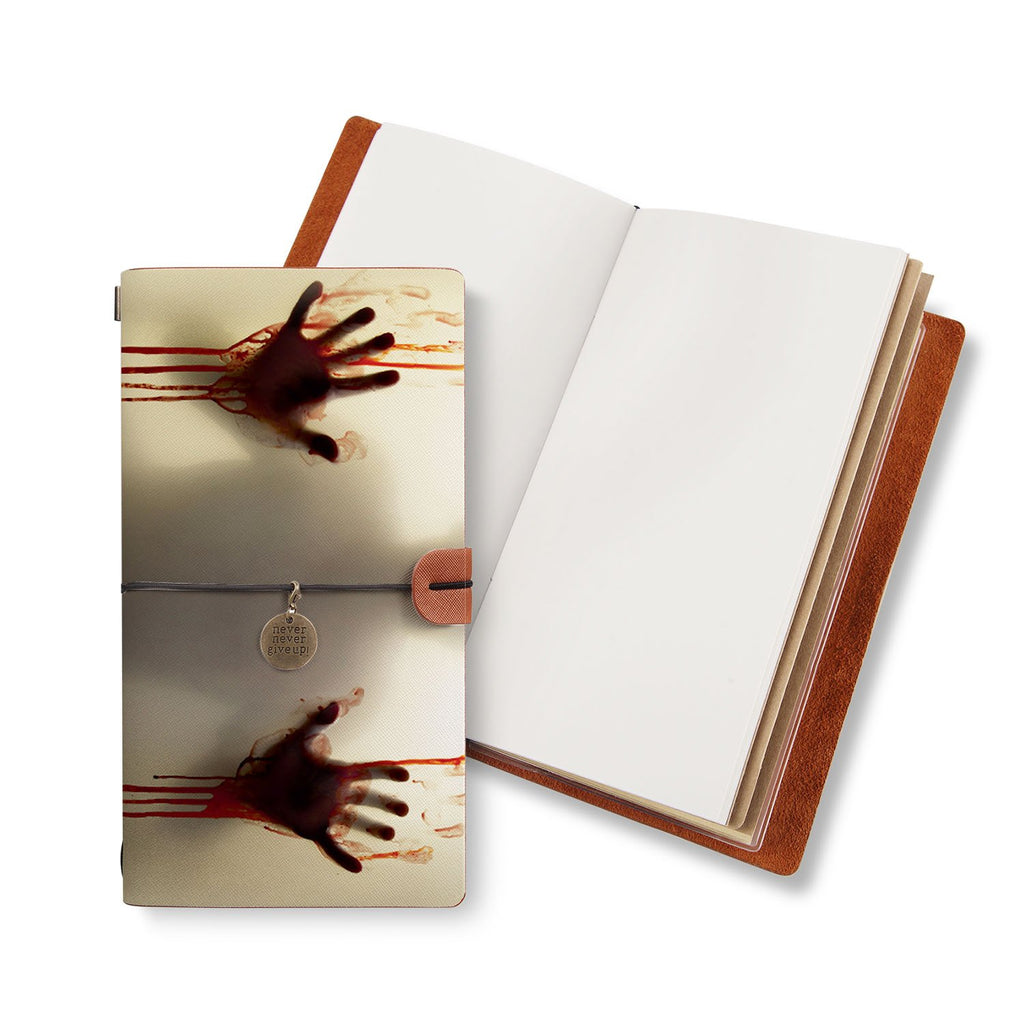 opened midori style traveler's notebook with Horror design