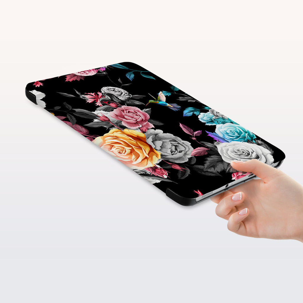 a hand is holding the Personalized Samsung Galaxy Tab Case with Black Flower design