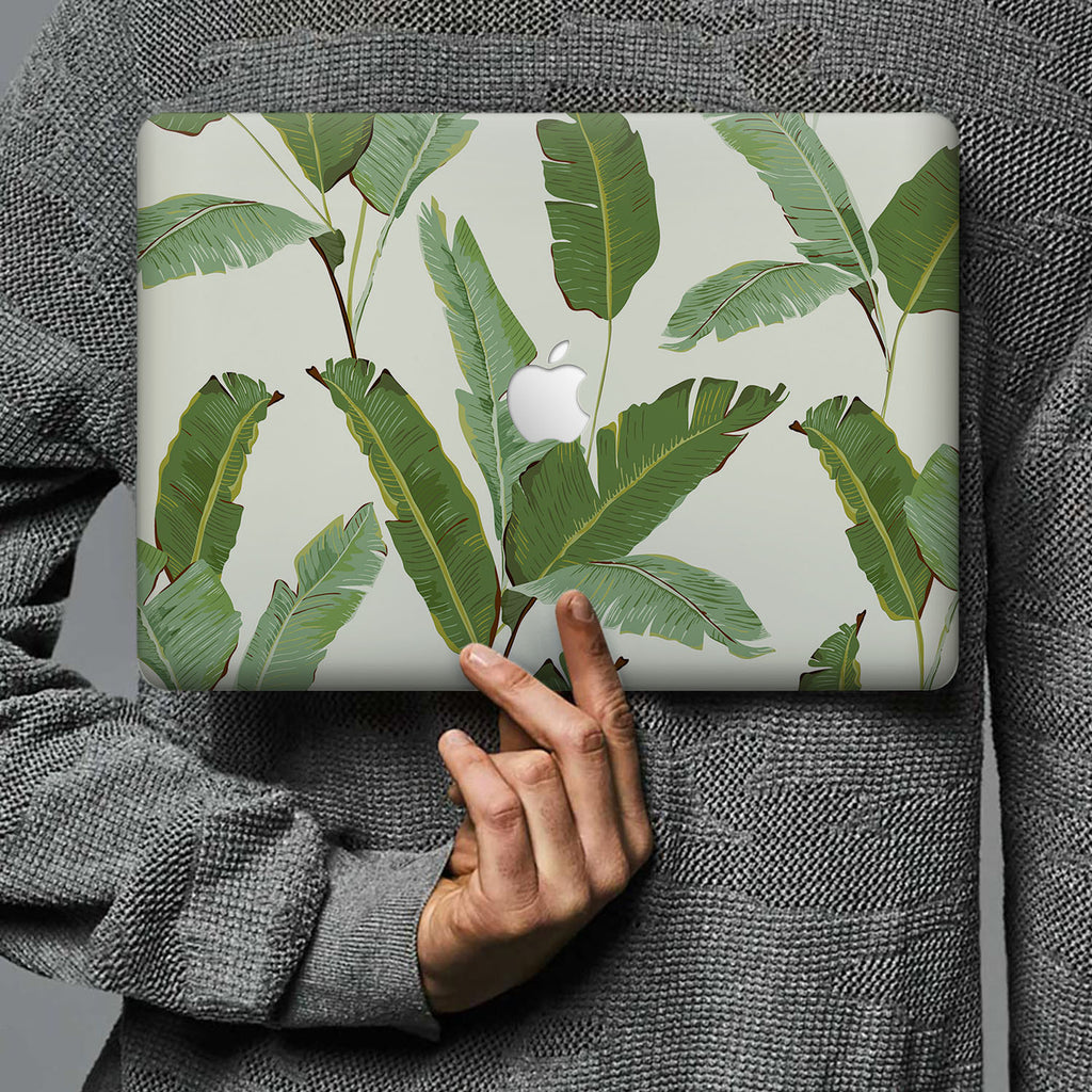 Form-fitting hardshell with Green Leaves design keeps scuffs and scratches at bay