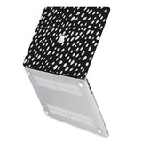 hardshell case with Polka Dot design has rubberized feet that keeps your MacBook from sliding on smooth surfaces