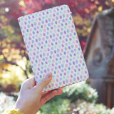 a girl holding personalized RFID blocking passport travel wallet with Watercolor Love design