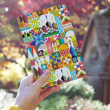 a girl holding personalized RFID blocking passport travel wallet with Whimsy Patterns design