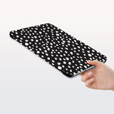 a hand is holding the Personalized Samsung Galaxy Tab Case with Polka Dot design