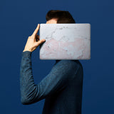The form-fitting glossy hardshell case with Pink Marble design