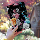 a girl holding personalized RFID blocking passport travel wallet with Black Flower design