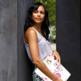 A yong girl holding personalized microsoft surface laptop case with Flamingo design
