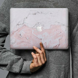 Form-fitting hardshell with Pink Marble design keeps scuffs and scratches at bay
