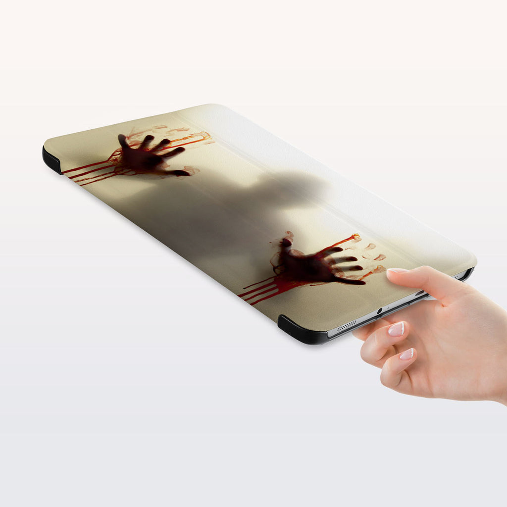 a hand is holding the Personalized Samsung Galaxy Tab Case with Horror design