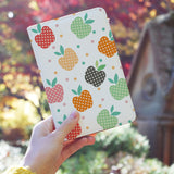 a girl holding personalized RFID blocking passport travel wallet with Fruits Pattern design