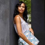 A yong girl holding personalized microsoft surface laptop case with Bird design