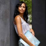 A yong girl holding personalized microsoft surface laptop case with Marble Gold design