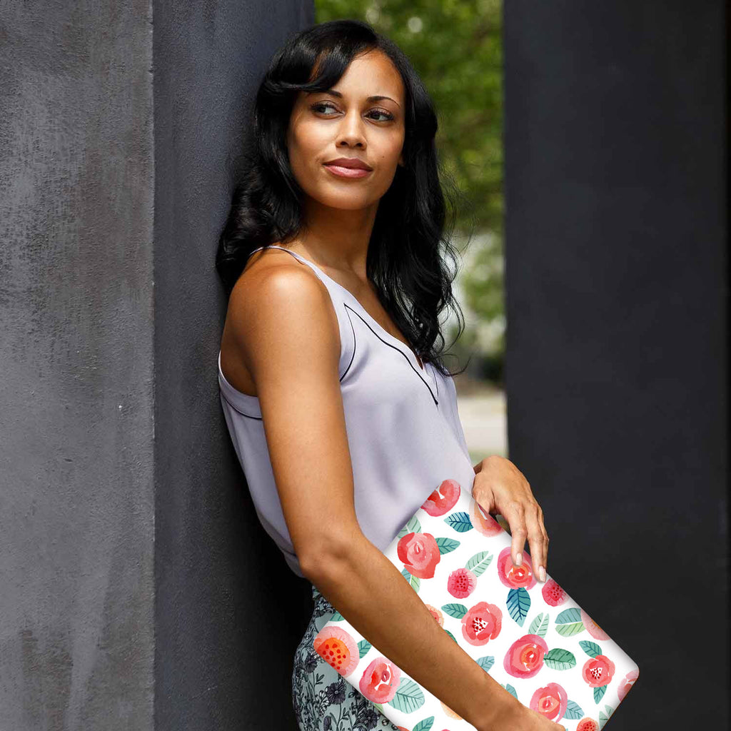 A yong girl holding personalized microsoft surface laptop case with Rose design