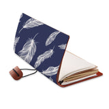 opened view of midori style traveler's notebook with Feather design
