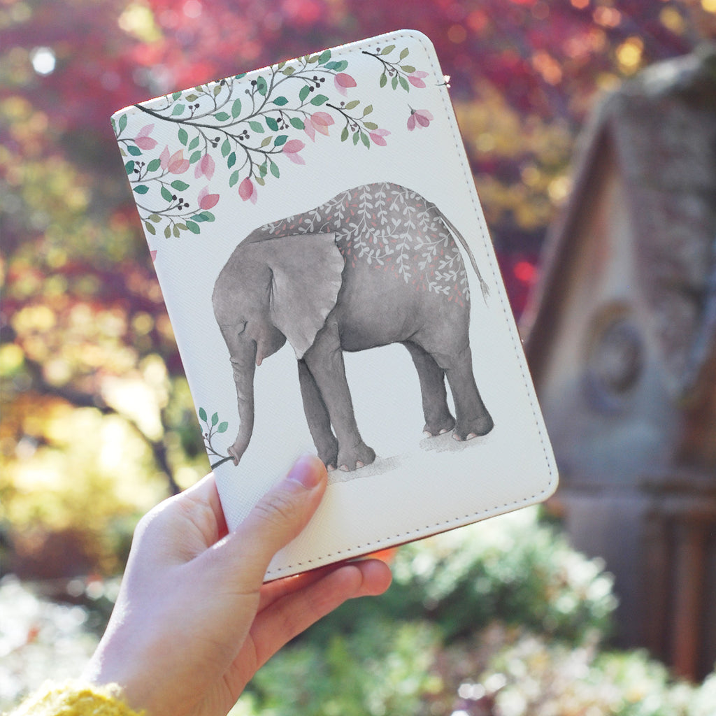 a girl holding personalized RFID blocking passport travel wallet with Watercolor Niceness design