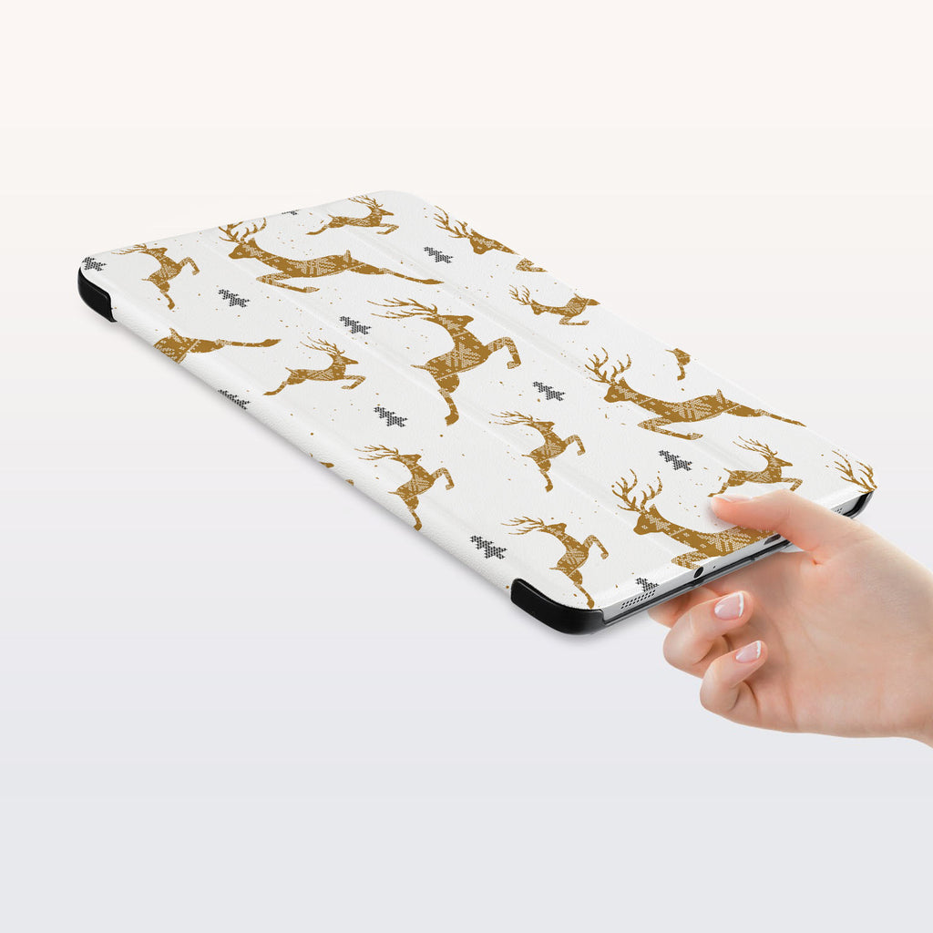 a hand is holding the Personalized Samsung Galaxy Tab Case with Christmas design